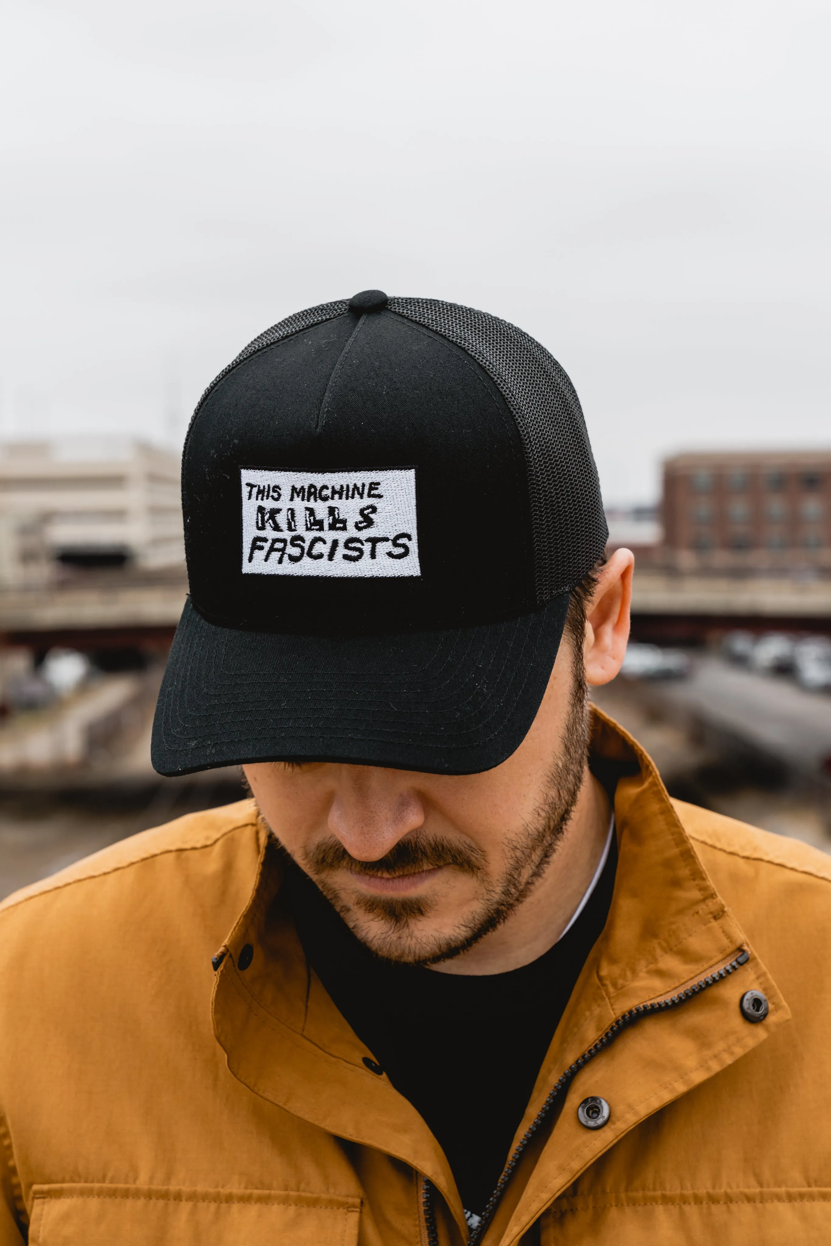 This Machine Kills Fascists Black Trucker Hat